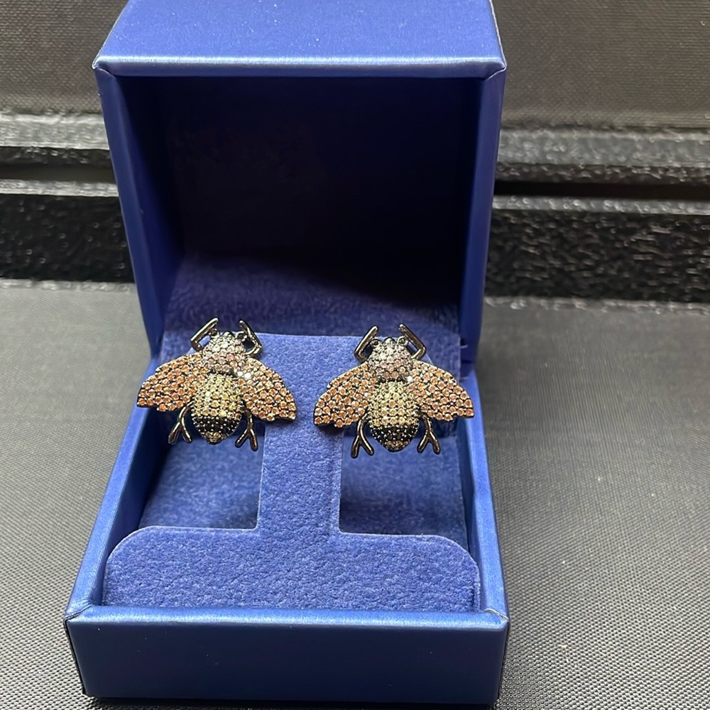 Fly on the wall earrings